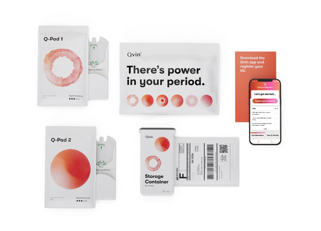 The contents of the Q-Pad Kit laid out: Q-Pad 1, Q-Pad 2, the Q-Strip Container, the return mailer and the instruction card